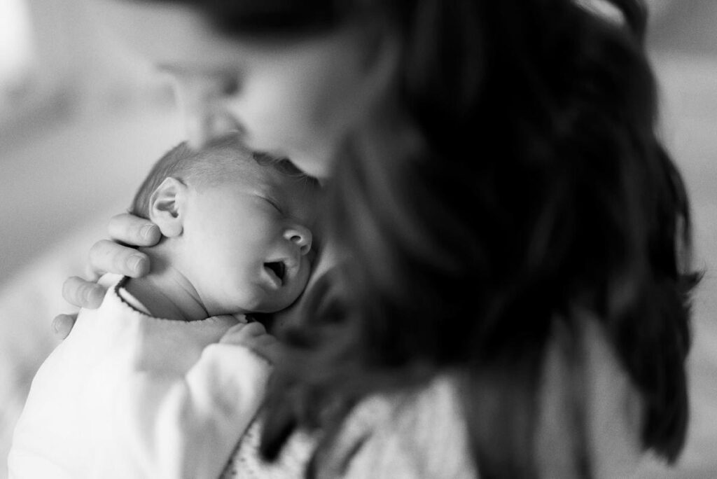 newborn-photography-ideas-tucked into chin