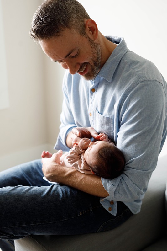 newborn-photography-ideas-dad gazing at baby